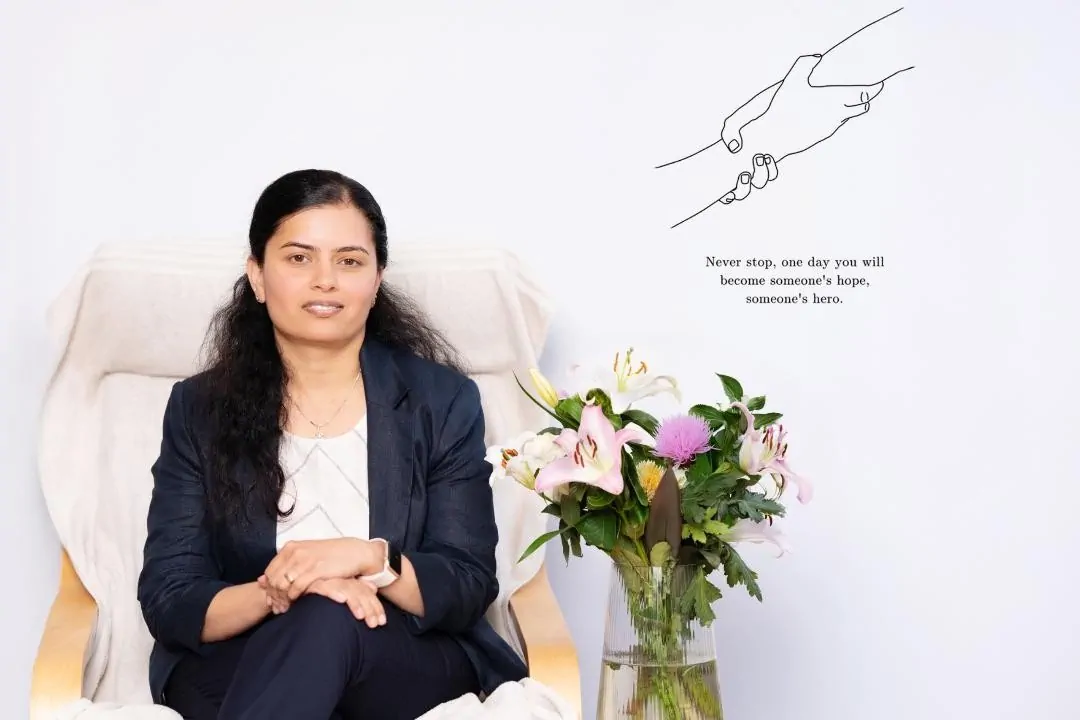 Jijimol Arun in a professional portrait setting.